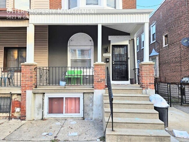 Building Photo - 5621 W Girard Ave