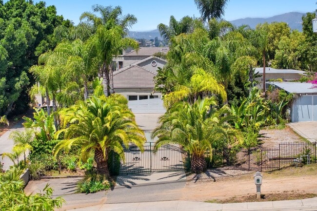 Building Photo - Beautiful Custom Built, Two-Story Home on Stunningly Landscaped Property with Gated Entrance!