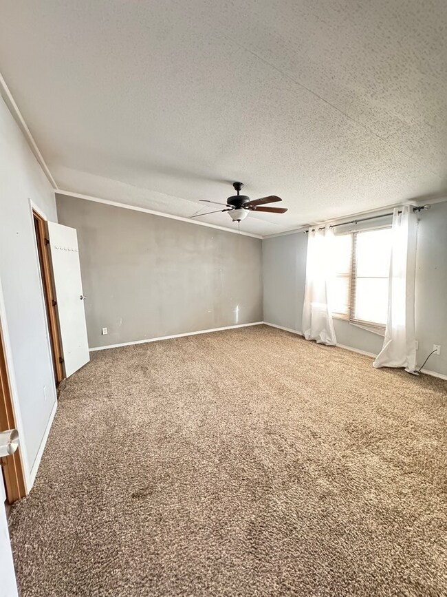 Building Photo - 10136 W University Blvd