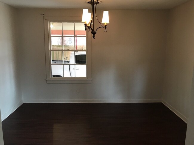 Building Photo - 3 Bedroom/1 bath home on corner lot with a large fenced back yard