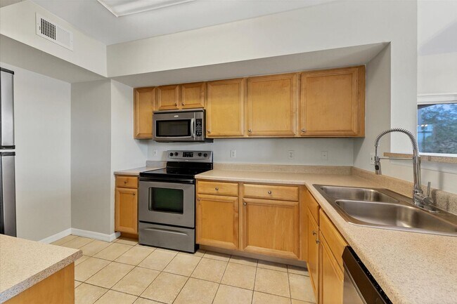 Building Photo - Updated 2/2 unit becoming available for an...
