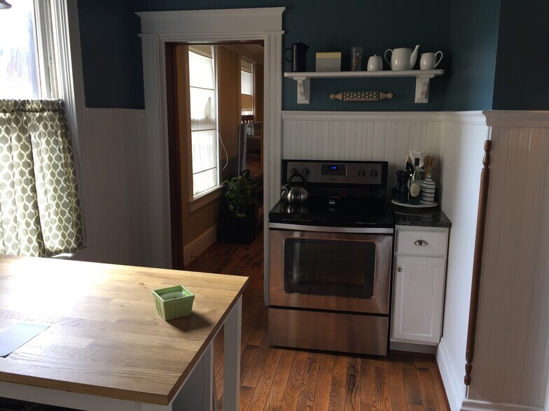 Right side of kitchen as enter from hallway - 130 Park Pl