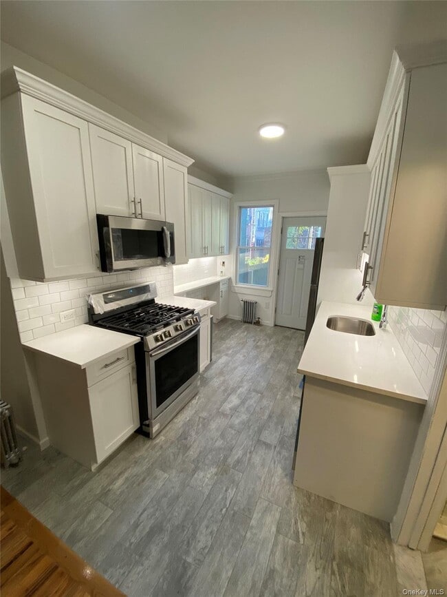 Building Photo - 57-09 Catalpa Ave