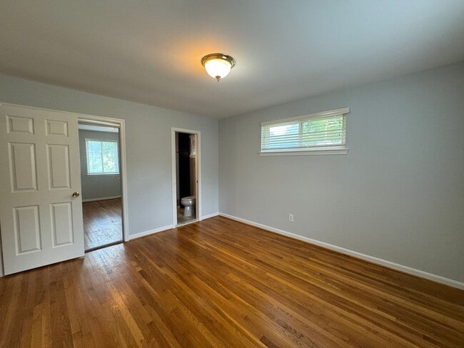 Building Photo - Sought-After 4 Bed 3 Bath L-Shaped Rambler...