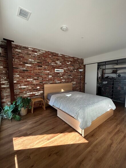 Bedroom with ample closet and great lighting - 57 N St NW