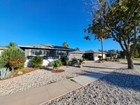 Building Photo - Beautiful 6-Bedroom Home with Pool & Outdo...