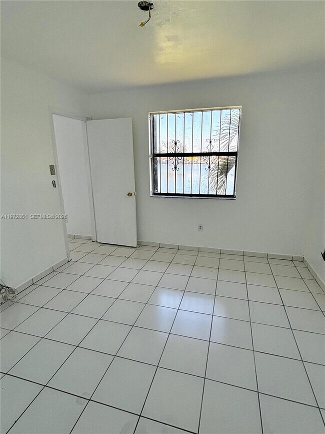 Building Photo - 6715 W 26th Dr