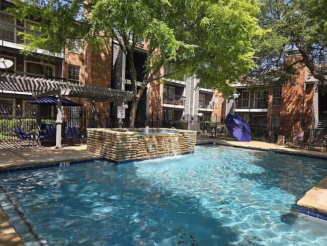 Building Photo - Charming 1-Bedroom Condo in Gated North Da...