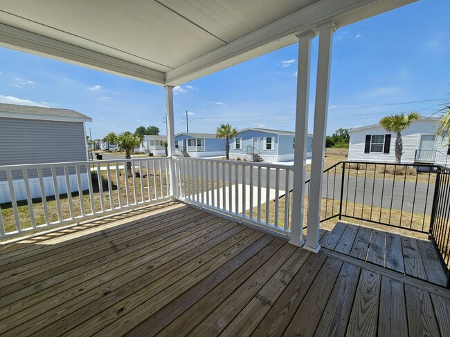 Building Photo - 6710 Hidden Oaks Dr