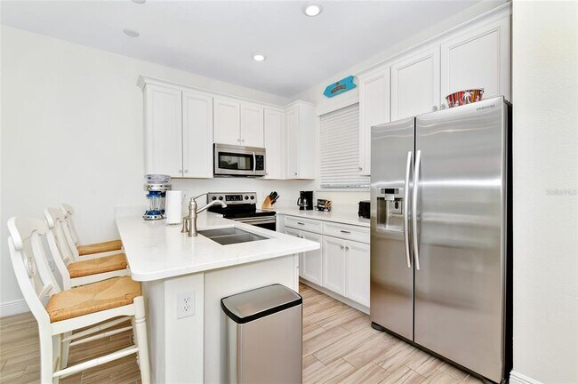 Building Photo - 8024 Flip Flop Way