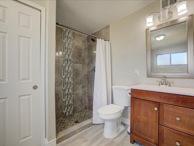 Building Photo - Spacious 4-Bedroom, 2-Bath Home with Extended Driveway & Large Backyard