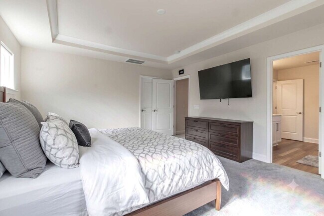 Building Photo - "Discover Spacious Living: 5-Bedroom Craftsman Home in Gated and Amenity-Rich Bretagne with Top-R...
