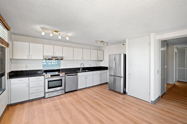 Building Photo - Spacious 2 Bedroom, 2 Bath with 2 Assigned Parking Stalls!