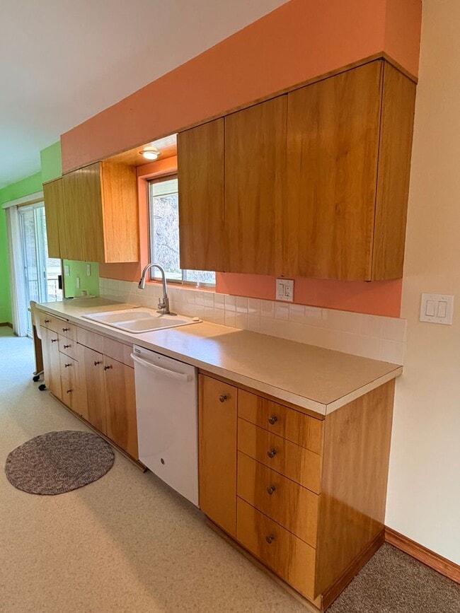 Building Photo - Country like setting! Spacious 3+ bed/ 1.5 bath house with garage, large yard, private deck and a...