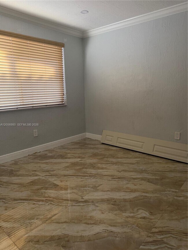 Building Photo - 240 Tamiami Canal Rd