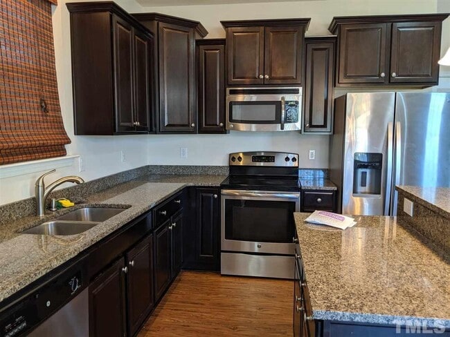 Building Photo - 4 Bedroom, 2.5 Bath Home for Rent in Garner NC | 2-Car Garage | Community Pool & Playground