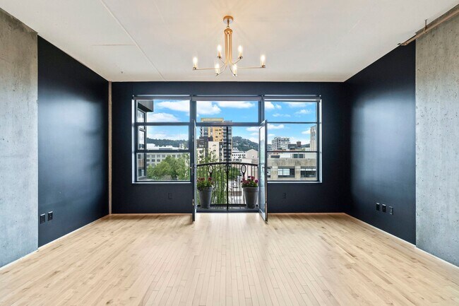 Building Photo - Elizabeth Lofts - 7th floor west facing Pearl District studio w/parking/concierge/most utilities