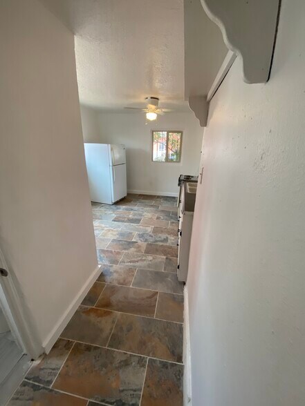 Kitchen from hall to bathroom - 508 5th St SW