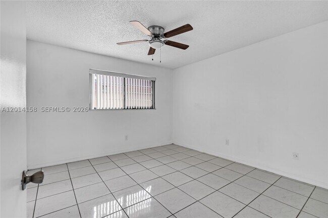 Building Photo - 5375 W 23rd Ct