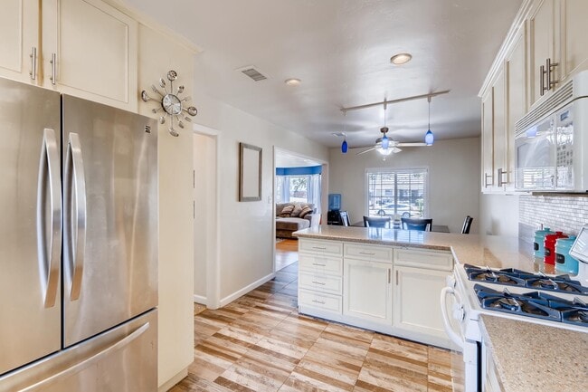 Building Photo - Upgraded 4 Bedroom/3 bath Home with Pool &...