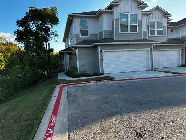 Building Photo - For Lease – Modern 2023 Condo Backing to Greenbelt | Creekside at Pioneer Crossing West