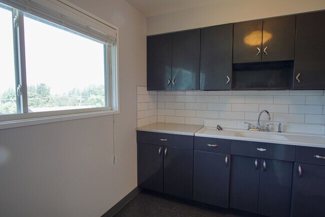 Building Photo - Fabulous Mid-Century Renovated 2Bdr w/Hardwoods, Dishwasher + Pets OK