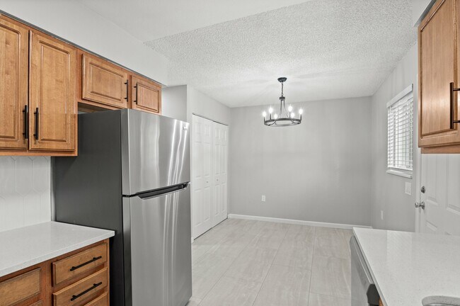 Explore this elegant kitchen space, perfect for culinary enthusiasts. - 5580 West 4th Avenue Townhomes