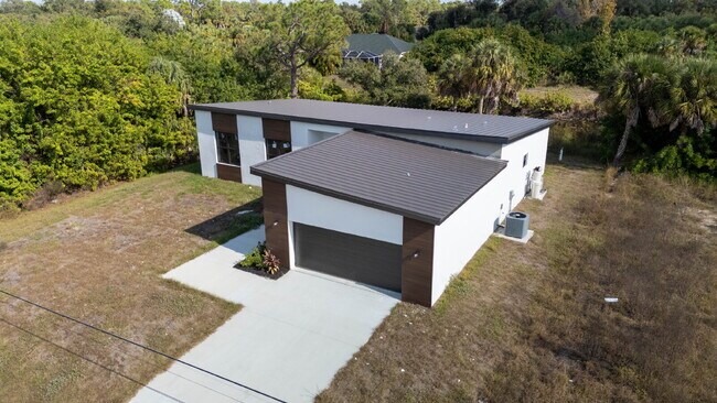 Building Photo - Brand New Construction 3/2  Canal Front Home for Rent in North Port
