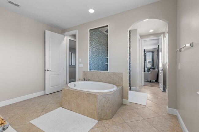 Building Photo - Luxury Waterfront Pool Home in Laureate Park | 4BR + Water Views