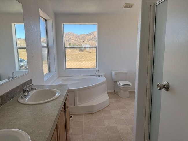 Building Photo - New Year Special! 50% Off First Month's Rent!