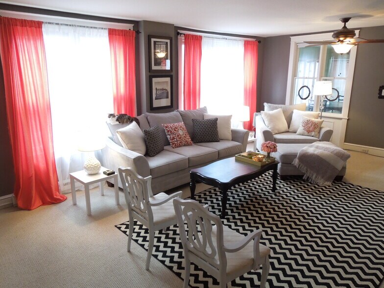 Living room as furnished by previous tenant - 218 E Orange St