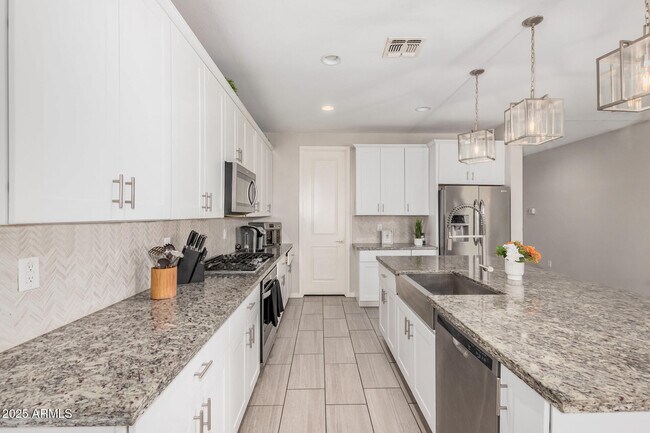 Building Photo - 11022 W Levi Dr