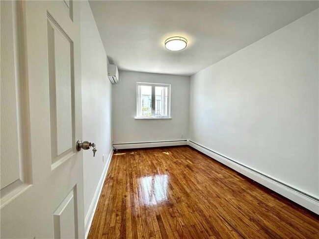 Building Photo - 66-61 73rd Pl