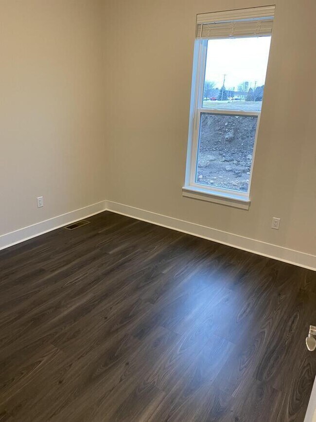 Building Photo - W218N16046 Tiger Lily Dr
