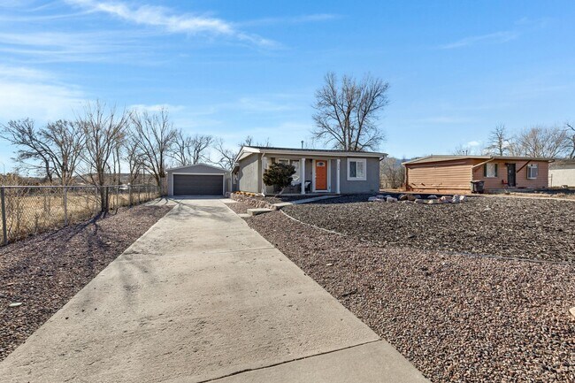 Building Photo - Updated Home in Security! A Must See!