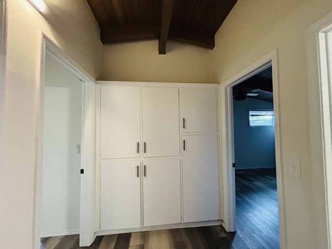 Building Photo - Quirky Mid-Century 3BR with High Beam Ceilings + Fenced Yard – $1,550
