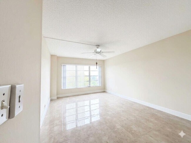 Building Photo - 10777 W Sample Rd