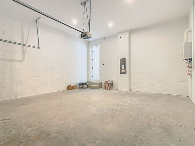 Building Photo - New Luxury Townhome in Celebration with All porcelain tiled floors. Island Village new construction