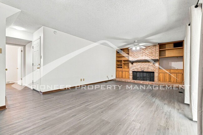 Building Photo - Spacious Home with Central AC and Traditional Wood Features