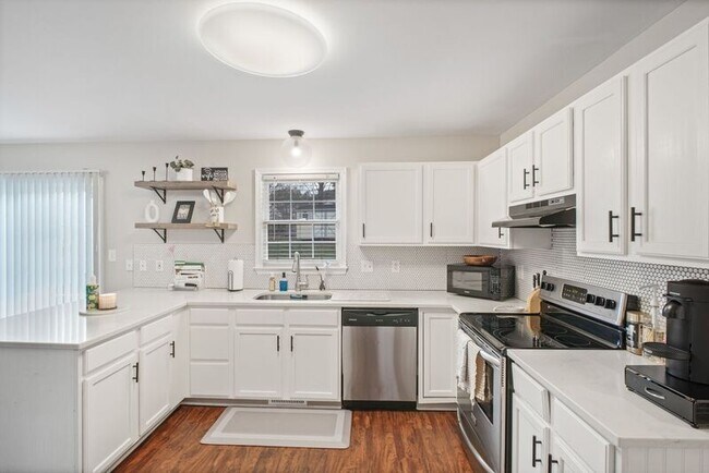 Building Photo - 4410 Caven Ct N