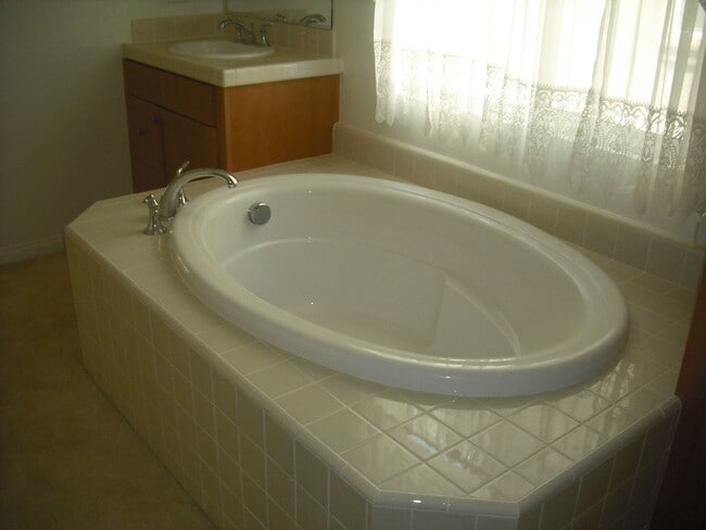 Building Photo - Move near the Beach into this spacious 5 b...
