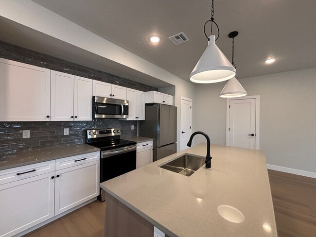 Building Photo - BRAND NEW END TOWNHOME FOR RENT + HALF OFF JANUARY RENT!