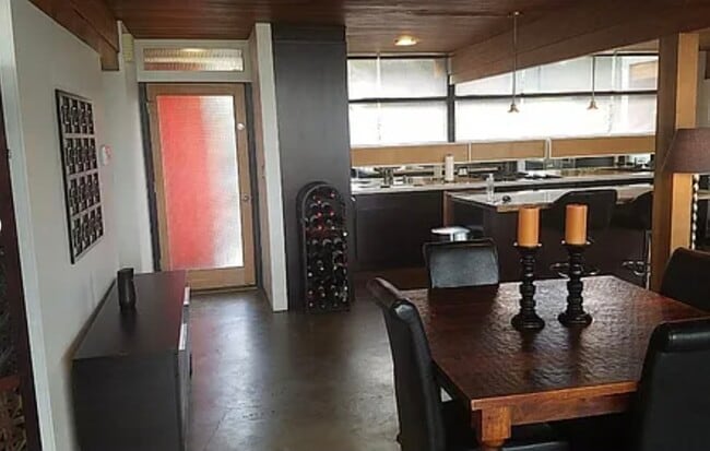 Open Floor Plan: Front Door, Dining Area and Custom Kitchen. - 300 Sequoia Dr