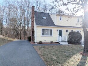 Building Photo - Stunning 2BR Townhome with Private Deck