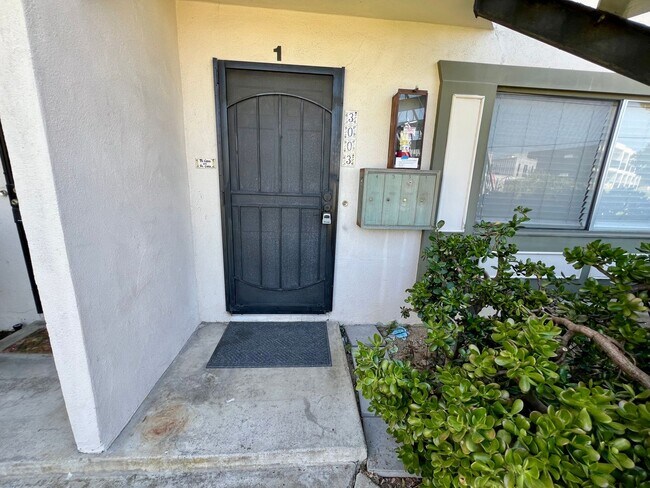 Building Photo - TWO PARKING SPACES INCLUDED! In Unit Washer & Dryer! Large Private Patio for Bikes, Boards and Bb...