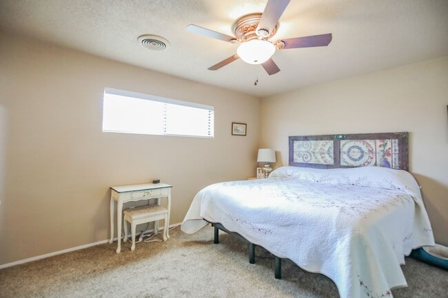 Building Photo - Three Bedroom Home with Plush Backyard