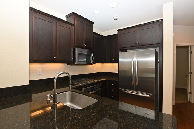 Building Photo - Tralee Village-Tri-Level Townhome, Modern ...