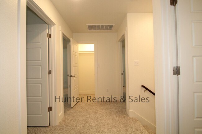 Building Photo - Upscale Four-Bedroom Townhome!