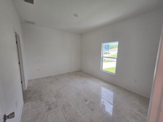 Building Photo - BRAND NEW CONSTRUCTION-3/2/1-MOVE IN READY