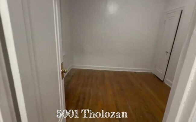 Building Photo - 5001 Tholozan Ave